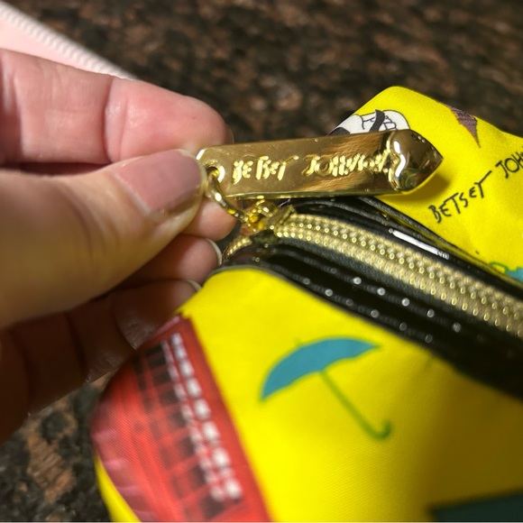 NWOT Betsey Johnson makeup travel bag in vibrant yellow with skull design. - Picture 4 of 10